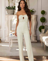 Elegant white jumpsuit with sparkling rhinestones and strapless cut