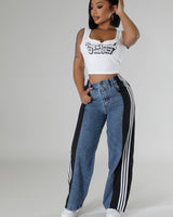High-waisted women's track pants with wide-leg cut