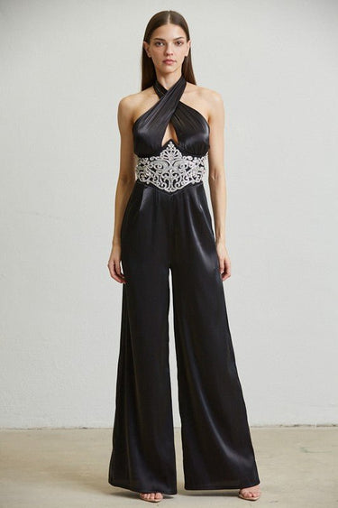 Black embellished halter jumpsuit with wide-leg pants and rhinestone waist
