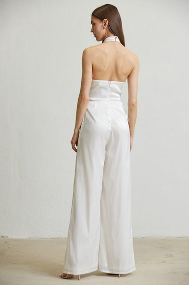 White halter jumpsuit with organza fabric and golden embroidery
