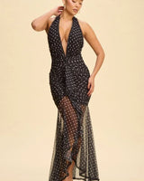 Midnight Muse Polka Dot Ruffle Maxi Dress – Black/White front view showing full-length maxi silhouette