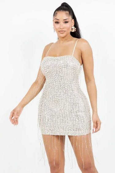 Elegant Silver fringe mini dress on model styled for going out