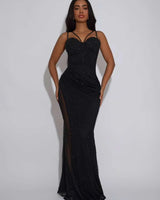 Elegant Black slit maxi dress on model styled for evening event