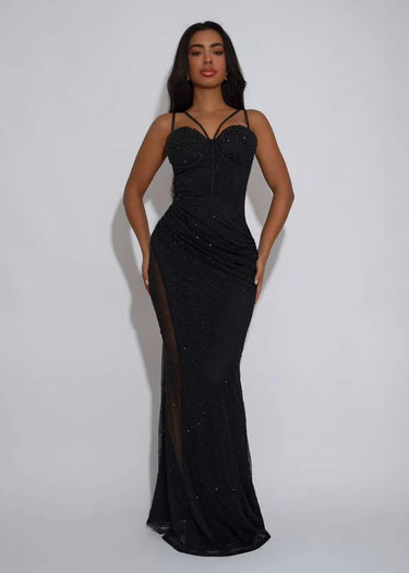 Elegant Black slit maxi dress on model styled for evening event