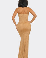 Elegant Nude slit maxi dress on model styled for evening event