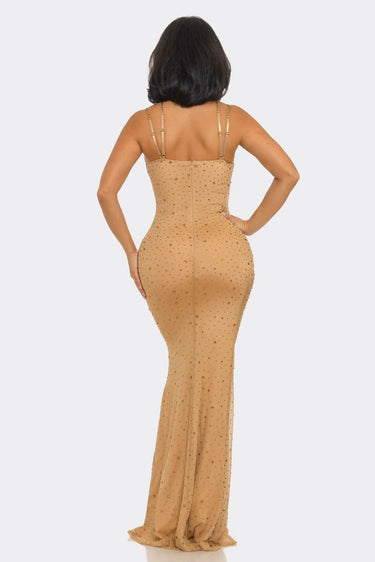 Elegant Nude slit maxi dress on model styled for evening event