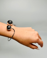 Silver spherical cuff bracelet with minimalist design