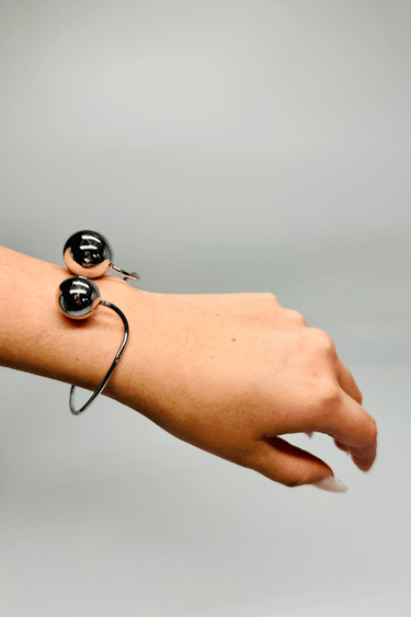 Silver spherical cuff bracelet with minimalist design