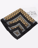 Women’s silk bandana scarf with bold all-over monogram pattern