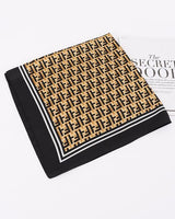 Geometric monogram silk scarf in black with neutral tones