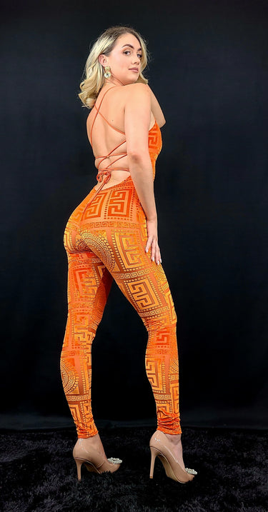 Close‑up of velvet mesh jumpsuit orange showing textured velvet and mesh detail