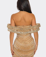Elegant Nude elegant mini dress on model styled for going out