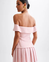Off-Shoulder Grace Pleated Skirt Set side view showing skirt silhouette and fit