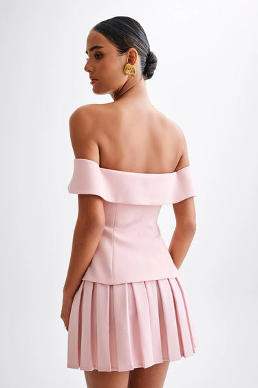 Off-Shoulder Grace Pleated Skirt Set side view showing skirt silhouette and fit