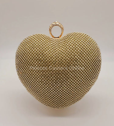 Sparkly gold heart-shaped clutch with gold hardware