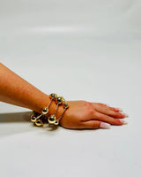 Orbital Flow Gold Cuff Bracelet with Sculptural Orbs - stylish accessory for every outfit