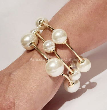 Gold cuff bracelet open‑bangle format – easy slip‑on style