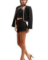 Pearl Essence Tweed Short Set (Black) full body look paired with heels and accessories