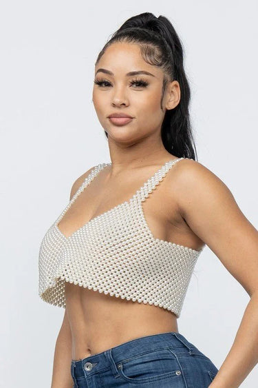 pearl encrusted white top detail closeup