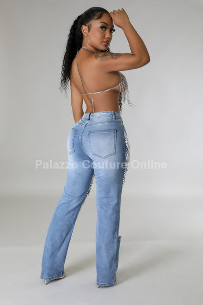 Women's Pearl Jeans with cascading pearl embellishments.