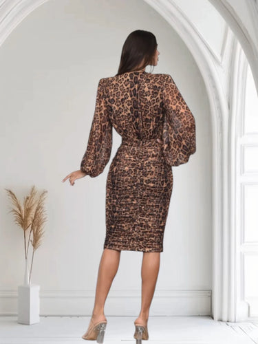 Plunge V-Neck Midi Dress — Sculpted & Elegant - Brown Multi close up detail of v-neck design