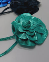 Unique black leather choker necklace adorned with a beautifully crafted flower detail.