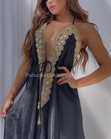 Elegant Black elegant maxi dress on model styled for evening event