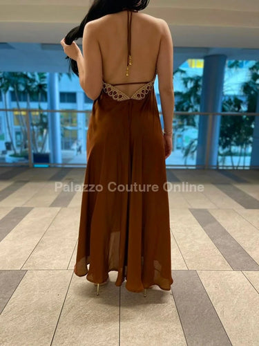 Private Oasis Maxi Dress  (Brown) close up detail of elegant design and fabric