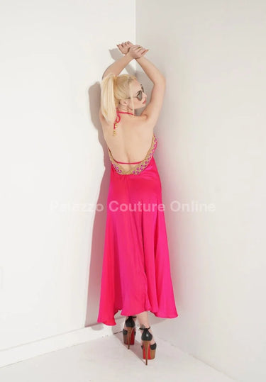Private Oasis Maxi Dress ( Hot Pink) alternate angle showcasing dress movement and drape