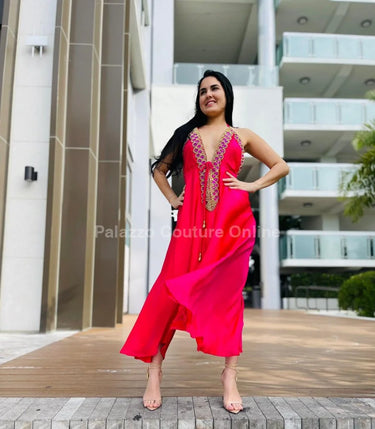 Elegant Hot Pink elegant maxi dress on model styled for evening event