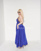 Elegant Royal Blue elegant maxi dress on model styled for evening event