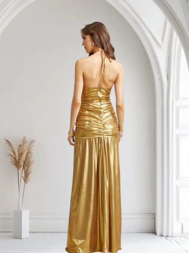 Elegant Gold metallic maxi dress on model styled for evening event