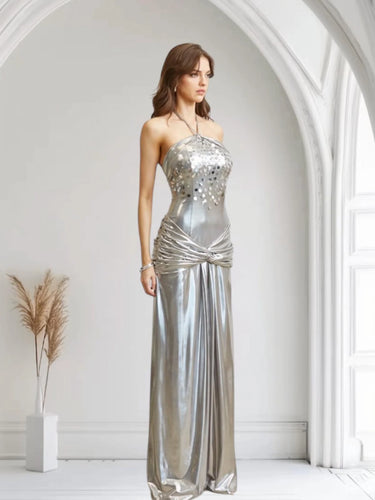 Elegant Silver metallic maxi dress on model styled for evening event
