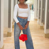 Radiant Pearl Embellished Wide-Leg Jeans close up of stylish fabric and construction detail