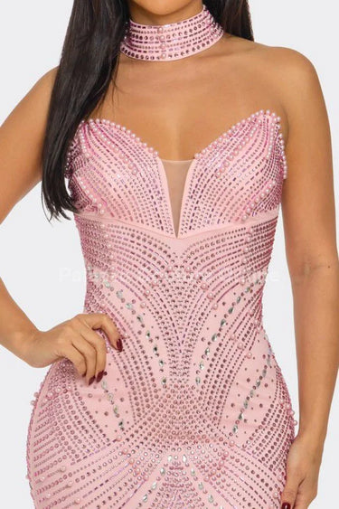 Elegant  mesh maxi dress on model styled for evening event