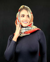 red derby style satin scarf with equestrian print flat lay