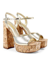 Lace-up ankle strap on Gold wedge heels