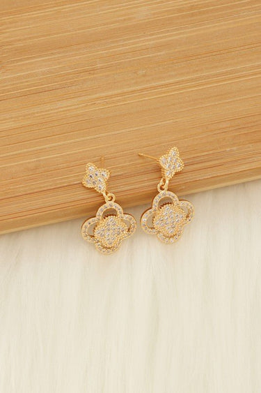 Gold quatrefoil drop earrings with pavé rhinestone detailing
