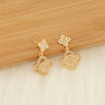 Rhinestone pavé clover-inspired drop earrings in gold-tone metal