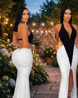 Elegant Black/Ivory mermaid maxi dress on model styled for evening event