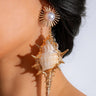 Gold shell earrings with pearl accent