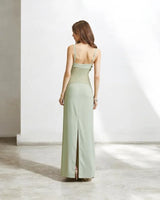 Elegant Sage elegant maxi dress on model styled for evening event