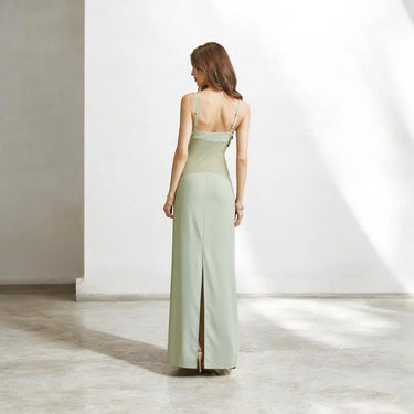 Elegant Sage elegant maxi dress on model styled for evening event
