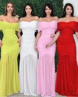 Elegant Chartreuse draped maxi dress on model styled for evening event