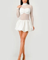 Sheer Elegance Puffer Mini Dress close up detail of elegant design