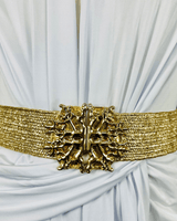 Gold statement belt with wide metallic band and ornate buckle