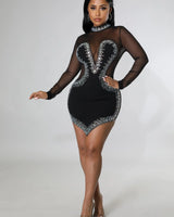 Silhouette Nights Black Rhinestone Dress with Sheer Details close up detail of elegant design