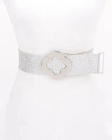 Silver metallic stretch belt with floral buckle on mannequin - women's waist belt