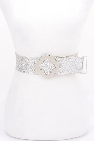 Silver metallic stretch belt with floral buckle on mannequin - women's waist belt