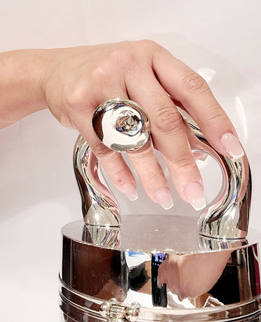 Detail view of bezel‑set gemstone on sterling silver ring